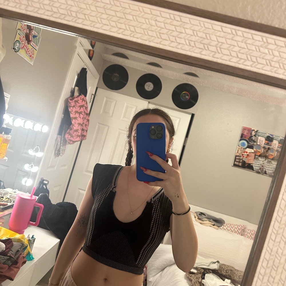 Urban Outfitters out from under crop top!